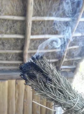 Rosemary bundle with curling smoke